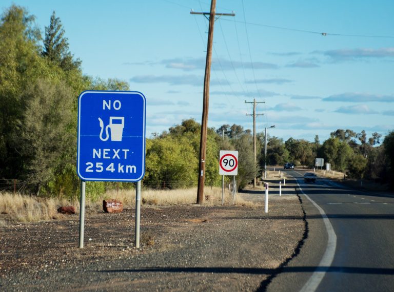 Reality of Australian Outback. “No fuel next 254 km” sign. Cobar, New South Wales, Australia. Reality of Australian Outback. “No fuel next 254 km” sign. Cobar, New South Wales, Australia.